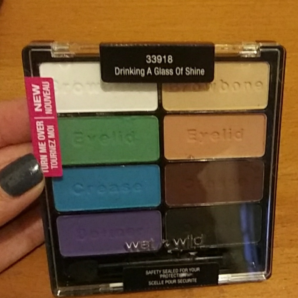 Brand new wet n wild drinking a glass of shine